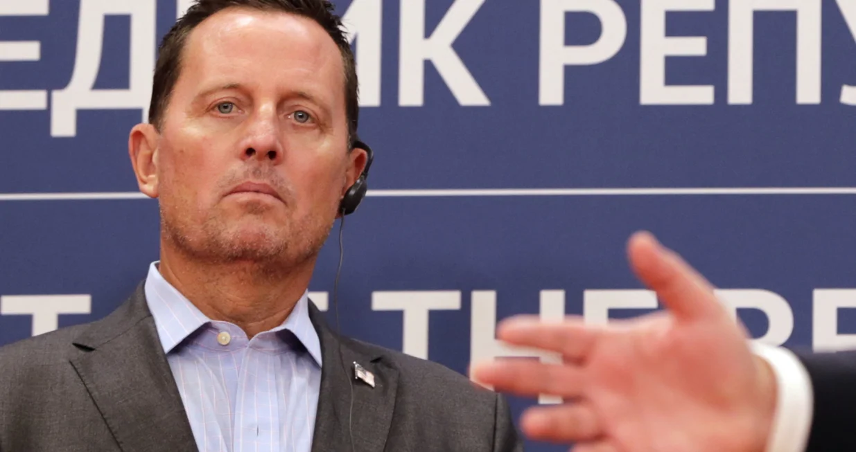 epa08688380 Advisor to the USA President on Kosovo-Serbia, Richard Grenell looks on during a joint press conference with Serbian President Aleksandar Vucic (not pictured) following their meeting in Belgrade, Serbia, 22 September 2020. Grenell is visiting Serbia for talks with business leaders and government officials after signing an agreement between Serbia and Kosovo for economic relations at the White House on 04 September. EPA/ANDREJ CUKIC/Andrej Cukic