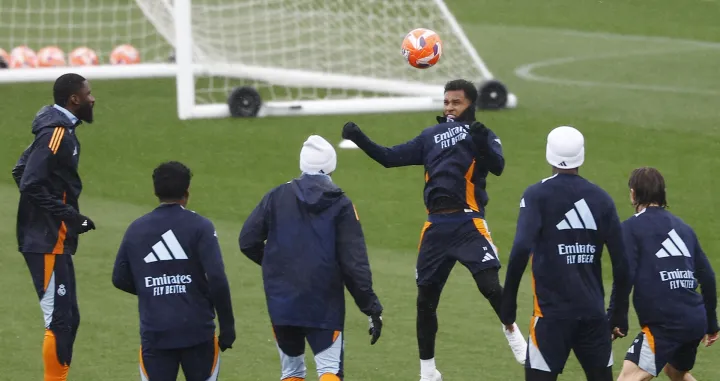 Soccer Football - LaLiga - Real Madrid Training - Ciudad Real Madrid, Valdebebas, Madrid, Spain - April 4, 2025 Real Madrid's Rodrygo and Antonio Rudiger during training REUTERS/Juan Medina