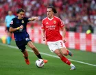 Soccer Football - Primeira Liga - Benfica v Arouca - Estadio da Luz, Lisbon, Portugal - April 13, 2025 Benfica's Alvaro Fernandez Carreras in action with Arouca's Pedro Santos REUTERS/Pedro Nunes