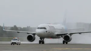epa09440745 A Eurowings plane crosses a symbolic water rainbow after landing in Boryspil airport, Kiev, Ukraine, 01 September 2021. Germany low-cost carrier Eurowings launched its regular routes from Duseldorf to Kiev and is the first company to operate new flights during the pandemic as Peter Ziegler, the Counselor of the German Embassy in Kyiv said. The airlines of the Lufthansa group together with Eurowings flights will operate 70 flights to Ukraine per week. EPA/SERGEY DOLZHENKO/Sergey Dolzhenko