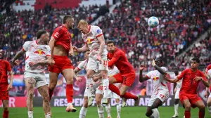 Soccer Football - Bundesliga - RB Leipzig v Bayern Munich - Red Bull Arena, Leipzig, Germany - May 3, 2025 Bayern Munich's Eric Dier scores their first goal REUTERS/Annegret Hilse DFL REGULATIONS PROHIBIT ANY USE OF PHOTOGRAPHS AS IMAGE SEQUENCES AND/OR QUASI-VIDEO.