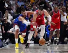 May 3, 2025; Denver, Colorado, USA; LA Clippers center Ivica Zubac (40) steals the ball away from Denver Nuggets center Nikola Jokic (15) in the second quarter during game seven of first round for the 2025 NBA Playoffs at Ball Arena. Mandatory Credit: Ron Chenoy-Imagn Images