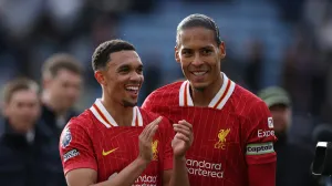 Soccer Football - Premier League - Leicester City v Liverpool - King Power Stadium, Leicester, Britain - April 20, 2025 Liverpool's Virgil van Dijk and Liverpool's Trent Alexander-Arnold celebrate after the match REUTERS/Phil Noble EDITORIAL USE ONLY. NO USE WITH UNAUTHORIZED AUDIO, VIDEO, DATA, FIXTURE LISTS, CLUB/LEAGUE LOGOS OR 'LIVE' SERVICES. ONLINE IN-MATCH USE LIMITED TO 120 IMAGES, NO VIDEO EMULATION. NO USE IN BETTING, GAMES OR SINGLE CLUB/LEAGUE/PLAYER PUBLICATIONS. PLEASE CONTACT YOUR ACCOUNT REPRESENTATIVE FOR FURTHER DETAILS..