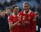 Soccer Football - Premier League - Leicester City v Liverpool - King Power Stadium, Leicester, Britain - April 20, 2025 Liverpool's Virgil van Dijk and Liverpool's Trent Alexander-Arnold celebrate after the match REUTERS/Phil Noble EDITORIAL USE ONLY. NO USE WITH UNAUTHORIZED AUDIO, VIDEO, DATA, FIXTURE LISTS, CLUB/LEAGUE LOGOS OR 'LIVE' SERVICES. ONLINE IN-MATCH USE LIMITED TO 120 IMAGES, NO VIDEO EMULATION. NO USE IN BETTING, GAMES OR SINGLE CLUB/LEAGUE/PLAYER PUBLICATIONS. PLEASE CONTACT YOUR ACCOUNT REPRESENTATIVE FOR FURTHER DETAILS..