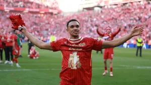 Soccer Football - Premier League - Liverpool v Tottenham Hotspur - Anfield, Liverpool, Britain - April 27, 2025 Liverpool's Trent Alexander-Arnold celebrates after winning the Premier League REUTERS/Phil Noble EDITORIAL USE ONLY. NO USE WITH UNAUTHORIZED AUDIO, VIDEO, DATA, FIXTURE LISTS, CLUB/LEAGUE LOGOS OR 'LIVE' SERVICES. ONLINE IN-MATCH USE LIMITED TO 120 IMAGES, NO VIDEO EMULATION. NO USE IN BETTING, GAMES OR SINGLE CLUB/LEAGUE/PLAYER PUBLICATIONS. PLEASE CONTACT YOUR ACCOUNT REPRESENTATIVE FOR FURTHER DETAILS..