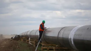 FILE PHOTO: A worker is seen next to a pipe at a construction site on the extension of Russia's TurkStream gas pipeline after a visit of Serbia's President Aleksandar Vucic and Bulgaria's Prime Minister Boyko Borissov, in Letnitsa, Bulgaria, June 1, 2020. REUTERS/ Stoyan Nenov/File Photo/Stoyan Nenov