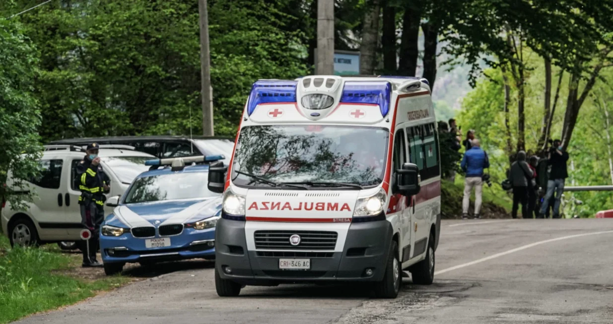 epa09223758 Italian Police in the area where a cable car crashed in Mottarone Stresa, near Turin, Italy, 23 May 2021. The cable car that connects Stresa with Mottarone has crashed, claiming 14 lives, according to the latest toll. Two children were seriously injured. The accident has been caused by the failure of a rope, in the highest part of the route which, starting from Lake Maggiore reaches an altitude of 1,491 meters. EPA/TINO ROMANO/Tino Romano