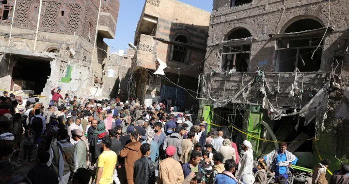 People gather at the site of a strike in Sanaa, Yemen April 21, 2025. REUTERS/Khaled Abdullah/Khaled Abdullah