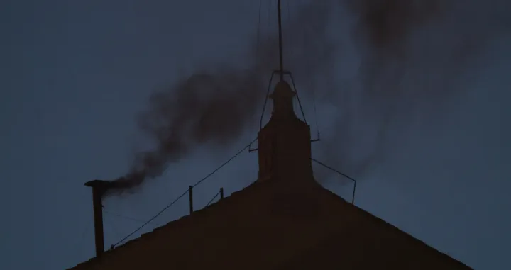 Black smoke rises from the chimney on the Sistine Chapel, indicating no decision has been made to elect a new pope, at the Vatican, May 7, 2025. REUTERS/Hannah McKay/Hannah Mckay