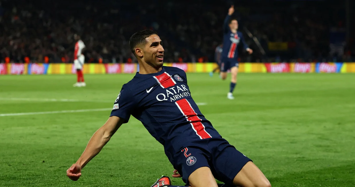 Soccer Football - Champions League - Semi Final - Second Leg - Paris St Germain v Arsenal - Parc des Princes, Paris, France - May 7, 2025 Paris St Germain's Achraf Hakimi celebrates scoring their second goal REUTERS/Gonzalo Fuentes  TPX IMAGES OF THE DAY