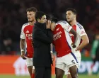 Soccer Football - Champions League - Semi Final - Second Leg - Paris St Germain v Arsenal - Parc des Princes, Paris, France - May 7, 2025 Arsenal manager Mikel Arteta and Thomas Partey look dejected after the match Action Images via Reuters/Peter Cziborra