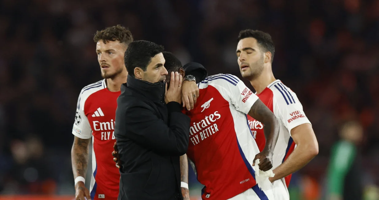 Soccer Football - Champions League - Semi Final - Second Leg - Paris St Germain v Arsenal - Parc des Princes, Paris, France - May 7, 2025 Arsenal manager Mikel Arteta and Thomas Partey look dejected after the match Action Images via Reuters/Peter Cziborra