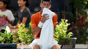 epa10395126 Novak Djokovic of Serbia rests during his match against Sebastian Korda of the United States in the Men's Singles Final 2023 Adelaide International Tennis Tournament at the Memorial Drive Tennis Centre in Adelaide, Australia, 08 January 2023. EPA/MATT TURNER AUSTRALIA AND NEW ZEALAND OUT