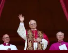 Newly elected Pope Leo XIV, Cardinal Robert Prevost of the United States appears on the balcony of St. Peter's Basilica, at the Vatican, May 8, 2025. REUTERS/Guglielmo Mangiapane  TPX IMAGES OF THE DAY/Guglielmo Mangiapane