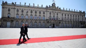 French President Emmanuel Macron welcomes Polish Prime Minister Donald Tusk on Stanislas square in Nancy, France, May 9, 2025. Macron and Tusk meet in Nancy as part of a summit to sign a treaty of friendship and enhanced cooperation between France and Poland. Christophe Petit Tesson/Pool via REUTERS  TPX IMAGES OF THE DAY/Christophe Petit Tesson