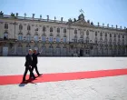 French President Emmanuel Macron welcomes Polish Prime Minister Donald Tusk on Stanislas square in Nancy, France, May 9, 2025. Macron and Tusk meet in Nancy as part of a summit to sign a treaty of friendship and enhanced cooperation between France and Poland. Christophe Petit Tesson/Pool via REUTERS  TPX IMAGES OF THE DAY/Christophe Petit Tesson