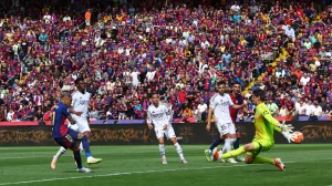 Soccer Football - LaLiga - FC Barcelona v Real Madrid - Estadi Olimpic Lluis Companys, Barcelona, Spain - May 11, 2025 FC Barcelona's Raphinha scores their fourth goal REUTERS/Albert Gea