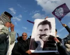 FILE PHOTO: FILE PHOTO: A demonstrator holds a picture of jailed Kurdish militant leader Abdullah Ocalan during a rally in Diyarbakir, Turkey, February 27, 2025. REUTERS/Sertac Kayar/File Photo/File Photo/Sertac Kayar