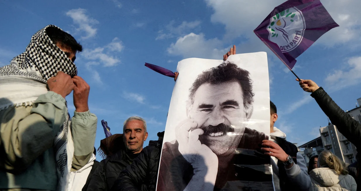 FILE PHOTO: FILE PHOTO: A demonstrator holds a picture of jailed Kurdish militant leader Abdullah Ocalan during a rally in Diyarbakir, Turkey, February 27, 2025. REUTERS/Sertac Kayar/File Photo/File Photo/Sertac Kayar