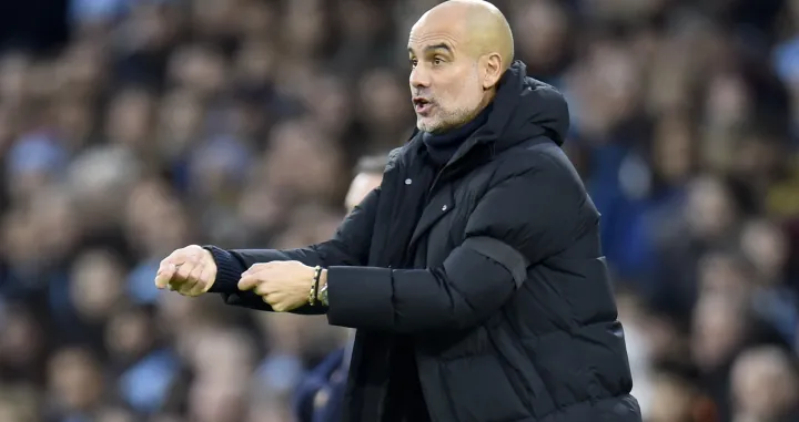 epa10383905 Manchester City manager Pep Guardiola reacts during the English Premier League soccer match between Manchester City and Everton in Manchester, Britain, 31 December 2022. EPA/Peter Powell EDITORIAL USE ONLY. No use with unauthorized audio, video, data, fixture lists, club/league logos or 'live' services. Online in-match use limited to 120 images, no video emulation. No use in betting, games or single club/league/player publications