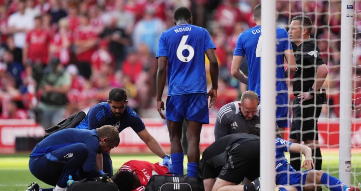 Soccer Football - Premier League - Nottingham Forest v Leicester City - The City Ground, Nottingham, Britain - May 11, 2025 Nottingham Forest's Taiwo Awoniyi receives medical attention after sustaining an injury REUTERS/Maja Smiejkowska EDITORIAL USE ONLY. NO USE WITH UNAUTHORIZED AUDIO, VIDEO, DATA, FIXTURE LISTS, CLUB/LEAGUE LOGOS OR 'LIVE' SERVICES. ONLINE IN-MATCH USE LIMITED TO 120 IMAGES, NO VIDEO EMULATION. NO USE IN BETTING, GAMES OR SINGLE CLUB/LEAGUE/PLAYER PUBLICATIONS. PLEASE CONTACT YOUR ACCOUNT REPRESENTATIVE FOR FURTHER DETAILS..
