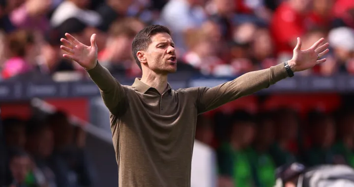 Soccer Football - Bundesliga - Bayer Leverkusen v FC Augsburg - BayArena, Leverkusen, Germany - April 26, 2025 Bayer Leverkusen coach Xabi Alonso reacts REUTERS/Thilo Schmuelgen DFL REGULATIONS PROHIBIT ANY USE OF PHOTOGRAPHS AS IMAGE SEQUENCES AND/OR QUASI-VIDEO.