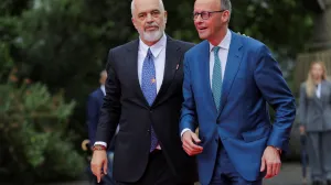 Albania's Prime Minister Edi Rama welcomes German Chancellor Friedrich Merz during the European Political Community Summit at Skanderbeg Square in Tirana, Albania, May 16, 2025. REUTERS/Valdrin Xhemaj/Valdrin Xhemaj