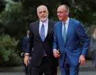 Albania's Prime Minister Edi Rama welcomes German Chancellor Friedrich Merz during the European Political Community Summit at Skanderbeg Square in Tirana, Albania, May 16, 2025. REUTERS/Valdrin Xhemaj/Valdrin Xhemaj