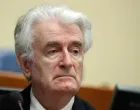 epa08529984 (FILE) - Former Bosnian Serb leader Radovan Karadzic appears in a courtroom before the International Residual Mechanism for Criminal Tribunals (MICT), which handles outstanding war crimes cases for the Balkans and Rwanda, in The Hague, The Netherlands, 24 April 2018 (reissued 06 July 2020). A quarter of a century ago, the world witnessed the worst mass murder on European soil since World War II. Some 7,000-8,000 Bosniaks were slaughtered and 20,000 civilians were forcibly displaced in an act of ethnic cleansing perpetrated in the small eastern Bosnian village of Srebrenica, whose name will forever be linked to the infamous 1995 massacre. Today, 25 years after the massacre, the memory of its victims is kept alive by several institutions, such as the Museum of Crimes Against Humanity and Genocide in Sarajevo or a permanent exhibit at the 'Memorial Center Srebrenica-Potocari' that now occupies the former headquarters of the Dutch UNPROFOR Battalion. EPA/YVES HERMAN/POOL ATTENTION: This Image is part of a PHOTO SET/Yves Herman/Pool