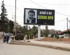 A sign depicts jailed Kurdish militant leader Abdullah Ocalan in Qamishli, Syria May 12, 2025. REUTERS/Orhan Qereman/Orhan Qereman