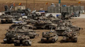 A view shows Israeli tanks near the Israel-Gaza border, in Israel May 17, 2025. REUTERS/Amir Cohen/Amir Cohen
