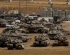 A view shows Israeli tanks near the Israel-Gaza border, in Israel May 17, 2025. REUTERS/Amir Cohen/Amir Cohen