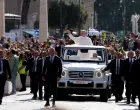 Pope Leo XIV arrives on the popemobile for his inaugural Mass at the Vatican, as seen from Rome, Italy May 18, 2025. REUTERS/MATTEO CIAMBELLI/Matteo Ciambelli