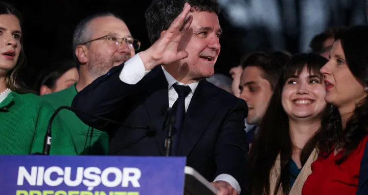 Presidential candidate Nicusor Dan reacts to first exit polls of Romania's second round of the presidential election, in Bucharest, Romania, May 18, 2025. REUTERS/Stoyan Nenov/Stoyan Nenov