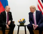FILE PHOTO: Russia's President Vladimir Putin and U.S. President Donald Trump talk during a bilateral meeting at the G20 leaders summit in Osaka, Japan, June 28, 2019. REUTERS/Kevin Lamarque/File Photo/Kevin Lamarque