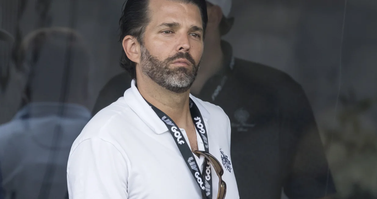 epa10097881 Donald Trump Jr. watches the first round of the LIV Golf Bedminster invitational, part of the new LIV Golf Invitational Series, at the Trump National Golf Club in Bedminster, New Jersey, USA, 29 July 2022. The tournament will be held from 29 - 31 July. EPA/JUSTIN LANE/Justin Lane