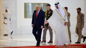 U.S. President Donald Trump meets Qatar's Emir Tamim bin Hamad Al Thani, in Doha, Qatar, May 14, 2025. REUTERS/Brian Snyder/Brian Snyder