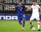 epa08653286 Bosnian's Elvir Koljic (L) in action against Polish Jan Bednarek (R) during the UEFA Nations League soccer match between Bosnia and Poland in Zenica, Bosnia and Herzegovina, 07 September 2020. EPA/FEHIM DEMIR