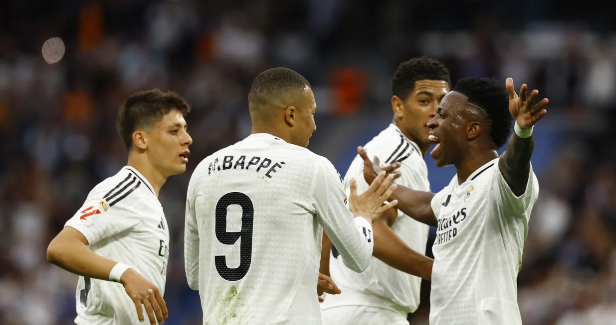 Soccer Football - LaLiga - Real Madrid v Celta Vigo - Santiago Bernabeu, Madrid, Spain - May 4, 2025 Real Madrid's Kylian Mbappe celebrates scoring their second goal with Real Madrid's Jude Bellingham, Real Madrid's Arda Guler and Real Madrid's Vinicius Junior REUTERS/Susana Vera