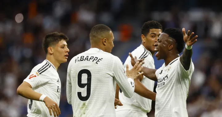 Soccer Football - LaLiga - Real Madrid v Celta Vigo - Santiago Bernabeu, Madrid, Spain - May 4, 2025 Real Madrid's Kylian Mbappe celebrates scoring their second goal with Real Madrid's Jude Bellingham, Real Madrid's Arda Guler and Real Madrid's Vinicius Junior REUTERS/Susana Vera