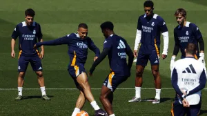 Soccer Football - LaLiga - Real Madrid Training - Ciudad Real Madrid, Valdebebas, Madrid, Spain - May 13, 2025 Real Madrid's Kylian Mbappe, Aurelien Tchouameni and Jude Bellingham with other teammates during training REUTERS/Susana Vera