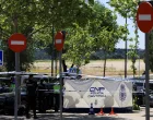 Police officers and members of the forensic team work at the spot where former Ukrainian politician Andriy Portnov, according to the Spain's Interior Ministry, was shot and killed by unidentified gunmen, outside a school in a wealthy suburb of Madrid, in Madrid, Spain May 21, 2025. REUTERS/Nacho Doce/Nacho Doce