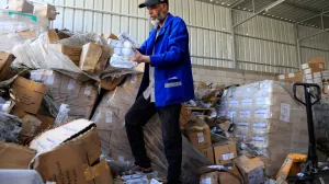 A Palestinian staff member inspects the medicine warehouse in Nasser Hospital after an Israeli strike, according to the Gaza Health Ministry, in Khan Younis, southern Gaza Strip, May 19, 2025. REUTERS/Hatem Khaled/Hatem Khaled