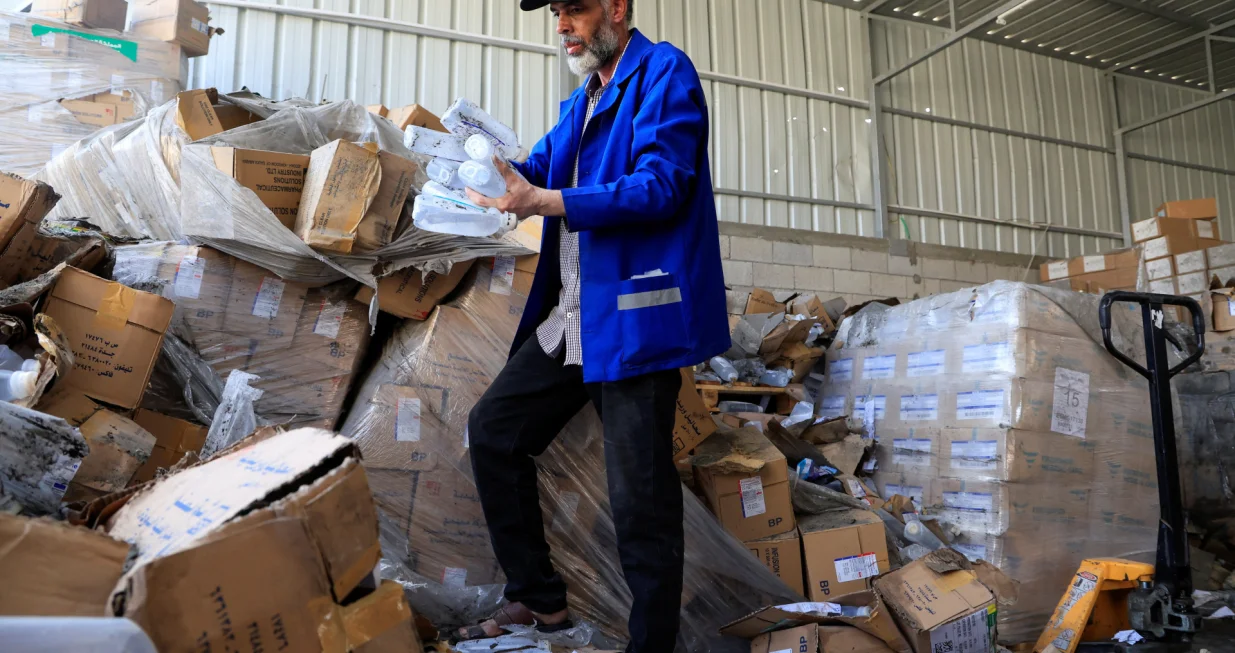 A Palestinian staff member inspects the medicine warehouse in Nasser Hospital after an Israeli strike, according to the Gaza Health Ministry, in Khan Younis, southern Gaza Strip, May 19, 2025. REUTERS/Hatem Khaled/Hatem Khaled