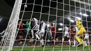 Soccer Football - Europa League - Final - Tottenham Hotspur v Manchester United - San Mames, Bilbao, Spain - May 21, 2025 Manchester United's Luke Shaw and Manchester United's Andre Onana in action with Tottenham Hotspur's Djed Spence and Tottenham Hotspur's Rodrigo Bentancur REUTERS/Andrew Couldridge