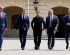 FILE PHOTO: German Chancellor Friedrich Merz, French President Emmanuel Macron, Ukranian President Voloydmyr Zelensky, British Prime Minister Keir Starmer and Polish Prime Minister Donald Tusk walk in the grounds of Mariynsky Palace, in Kyiv, Ukraine, May 10, 2025. Ludovic Marin/Pool via REUTERS/File Photo/Ludovic Marin