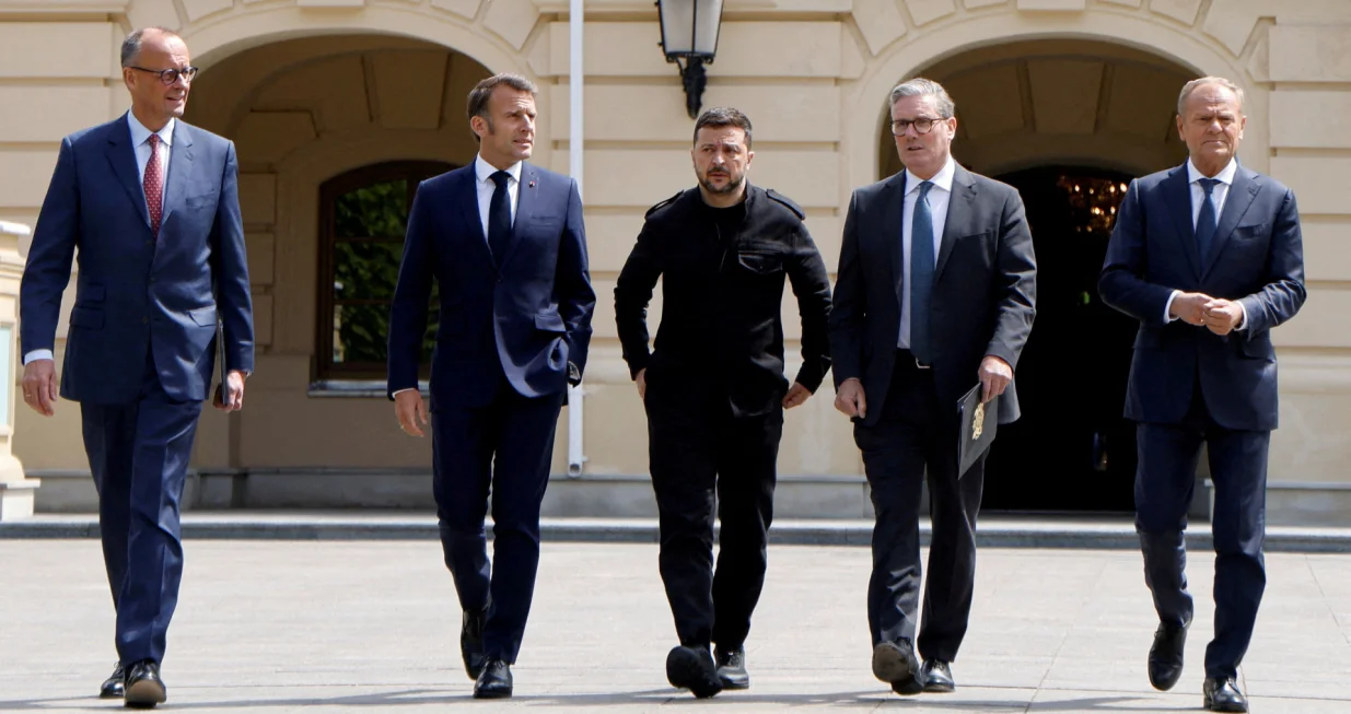 FILE PHOTO: German Chancellor Friedrich Merz, French President Emmanuel Macron, Ukranian President Voloydmyr Zelensky, British Prime Minister Keir Starmer and Polish Prime Minister Donald Tusk walk in the grounds of Mariynsky Palace, in Kyiv, Ukraine, May 10, 2025. Ludovic Marin/Pool via REUTERS/File Photo/Ludovic Marin