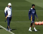 Soccer Football - LaLiga - Real Madrid Training - Ciudad Real Madrid, Valdebebas, Madrid, Spain - May 13, 2025 Real Madrid coach Carlo Ancelotti and Rodrygo during training REUTERS/Susana Vera