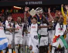 Soccer Football - Europa League - Final - Tottenham Hotspur v Manchester United - San Mames, Bilbao, Spain - May 21, 2025 Tottenham Hotspur's Son Heung-min lifts the trophy with teammates after winning the Europa League Final REUTERS/Andrew Couldridge