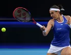 epa10382530 Caroline Garcia of France in action against Nadia Podoroska of Argentina during the 2023 United Cup tennis match between France and Argentina at RAC Arena in Perth, Australia, 30 December 2022. EPA/RICHARD WAINWRIGHT AUSTRALIA AND NEW ZEALAND OUT